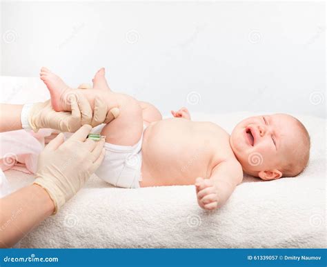 Baby Gets An Injection Stock Photo - Image: 61339057