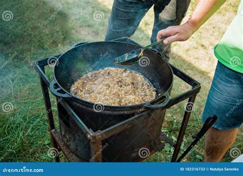 Pilaf Cooking In Cauldron On Fire Outdoors Series Stock Image Image