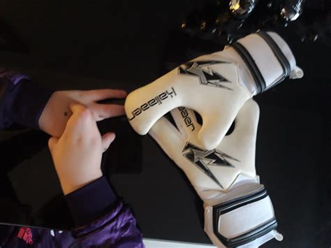 Scots firm creates custom goalie gloves for lad, 9, with deformed hands ...