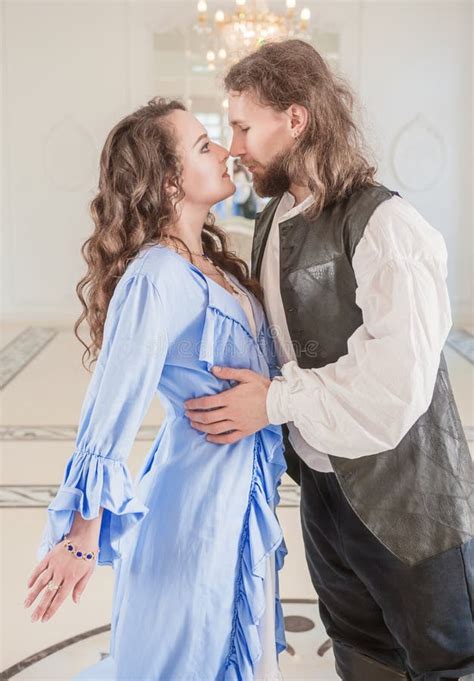 Beautiful Passionate Couple Woman And Man In Medieval Clothes Stock