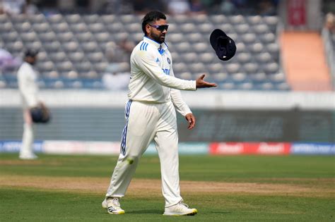 Rohit Sharma tosses his cap | ESPNcricinfo.com