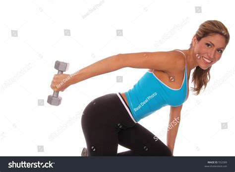 Sexy Latina Fitness Instructor Working Out With Free Weights Stock