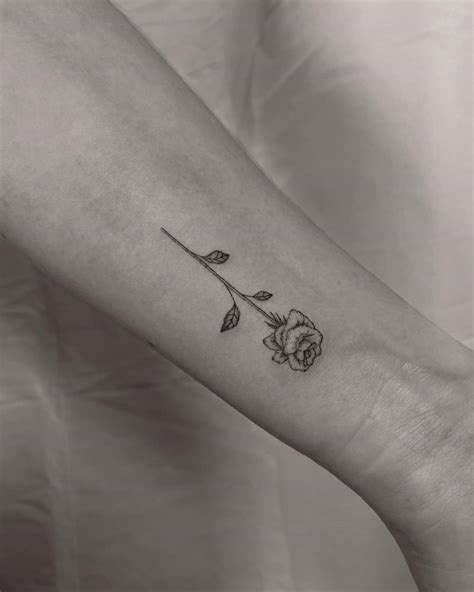 Illustrative Style Rose Tattoo Located On The Wrist