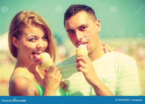 Man And Woman Eating Ice Cream On Beach Stock Photo Image Of Cream