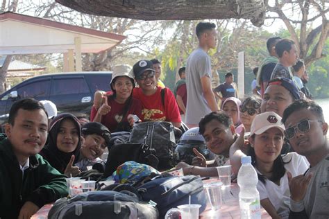 Atambua, Nusa Tenggara Timur, 2022 Tourists sitting around a table ...