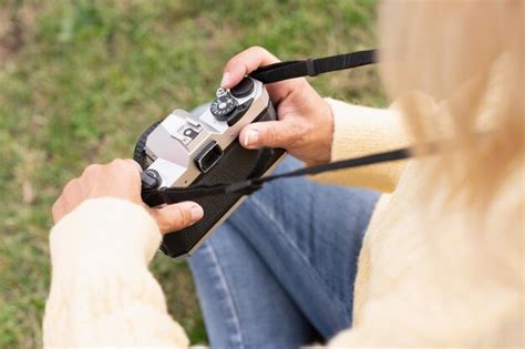 Premium Photo Midsection Of Man Holding Camera