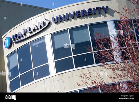 A logo sign on a building occupied by Kaplan University Stock Photo - Alamy