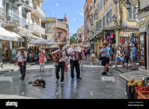 Street musicians in Kerkira city, Corfu Island, Greece Stock Photo - Alamy