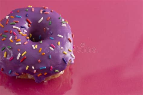 Purple Glazed Donut with Rainbow Sprinkles on Top Stock Image - Image of frosting, stereotype ...