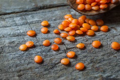 Red Lentils In Wooden Spoon On Wooden Background Stock Image Image Of