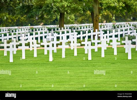 Rows And Lines Of Headstones At The American War Cemetery And Memorial