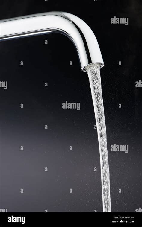 Tap with Running Water Stock Photo - Alamy