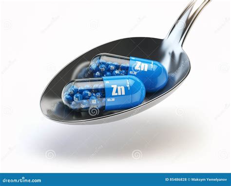 Pills with Zinc Zn Element in the Spoon. Dietary Supplements Stock ...