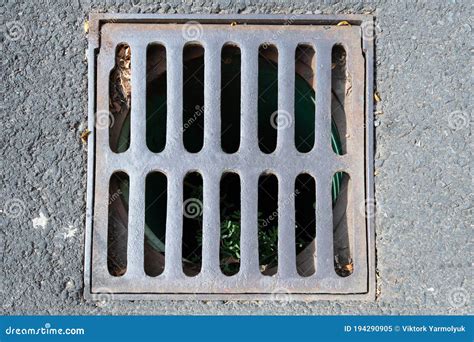 An Iron Grate Covering The City Sewer Stock Image Image Of Metal