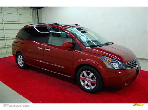 Red Brawn Metallic Nissan Quest Se Photo