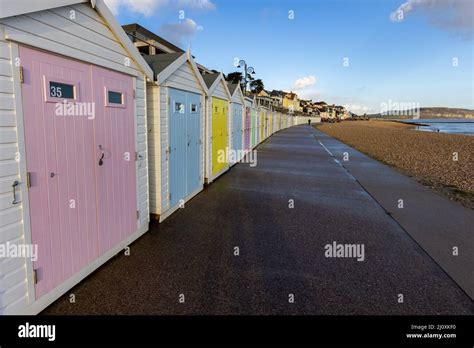 Coloured Beachuts On Seafront At Lyme Regis Dorset UK Stock Photo Alamy