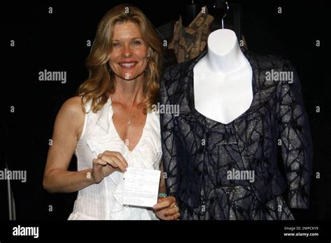 Kate Vernon And Her Selected Item At The Battlestar Galactica Prop And