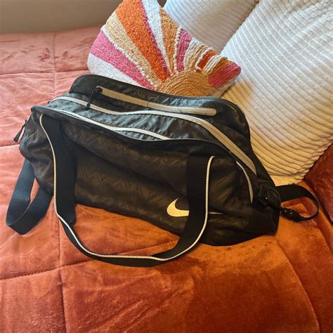 Small black nike duffle bag Perfect for weekend... - Depop