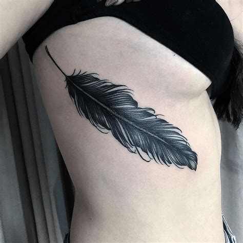 Feather Tattoo Ideas - Guide On Meaning and History - Tattoo Stylist