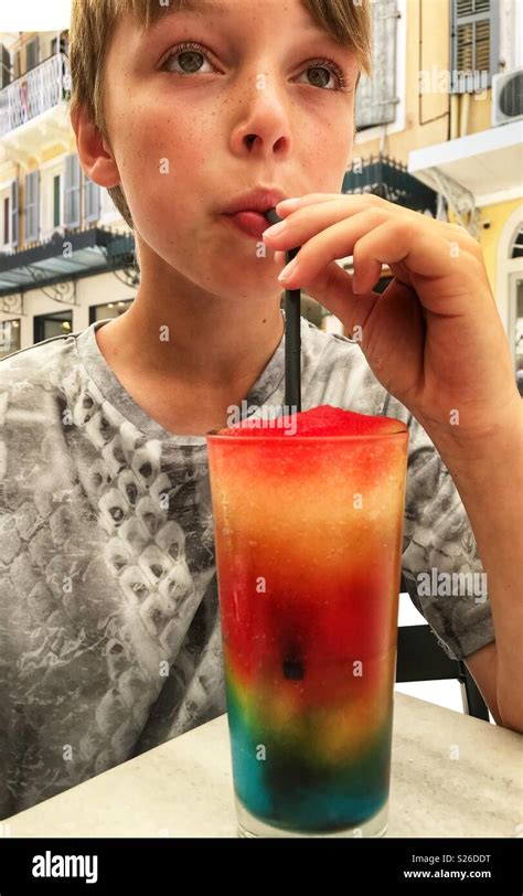 Boy Drinking Slush Stock Photo Alamy