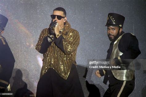 Daddy Yankee performing during a concert at Estadio Andrés Quintana ...