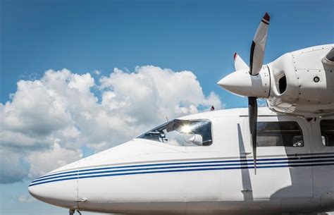 Premium Photo | Private jet exterior against the blue sky. airplane cockpit