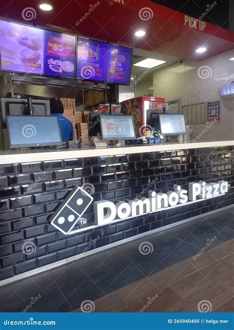 Dominos pizza store editorial image. Image of cashier - 265940400
