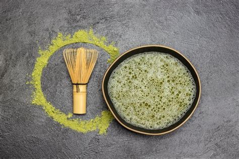 Premium Photo | Bowl of matcha green tea bamboo whisk