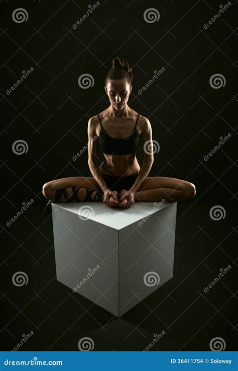 Slim And Athletic Girl In A Bikini At The Beach Jumping Into The Air