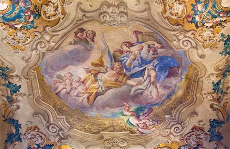 An Ornate Painting On The Ceiling Of A Building