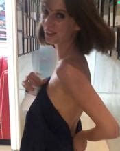 Maya Hawke Showing Off Her Naked Body Cowered With A Blue Towel While Running Around AZNude