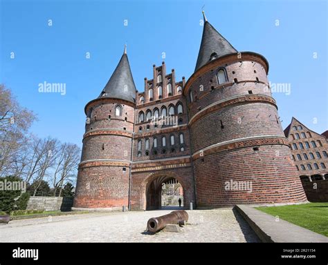 Lubeck Holstentor Holsten Gate With Canon Famous Historic Landmark