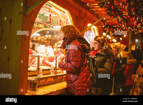 visitors in front of food stall at the opening day of Bochum Christmas ...