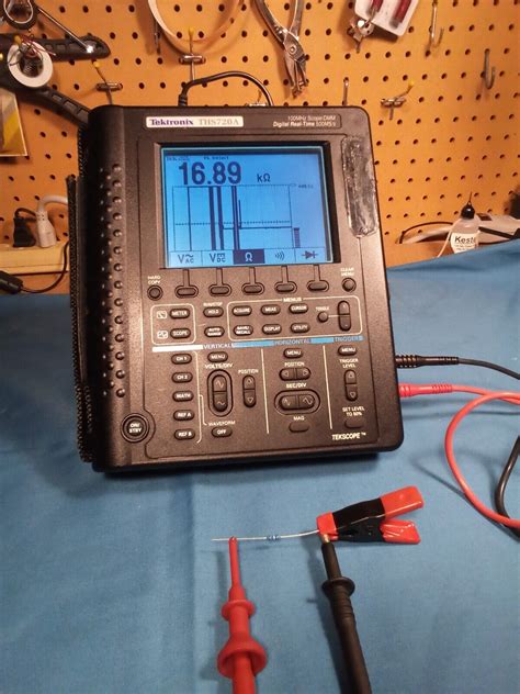 Tektronix THS720A 2 Channel 100MHz 500MS S Digital Oscilloscope DMM