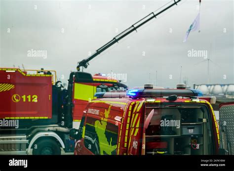 Emergency vehicles of the Hamburg Fire Department in the Harbor of ...