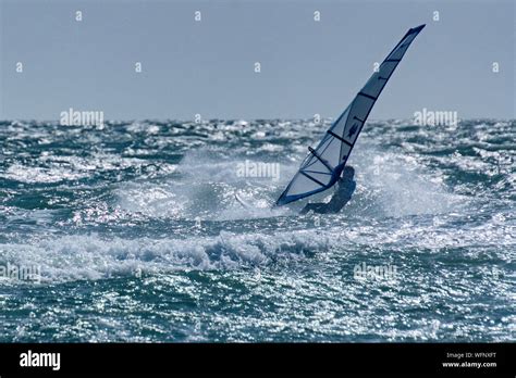 Windsurfing on West Wittering beach, West Sussex Stock Photo - Alamy