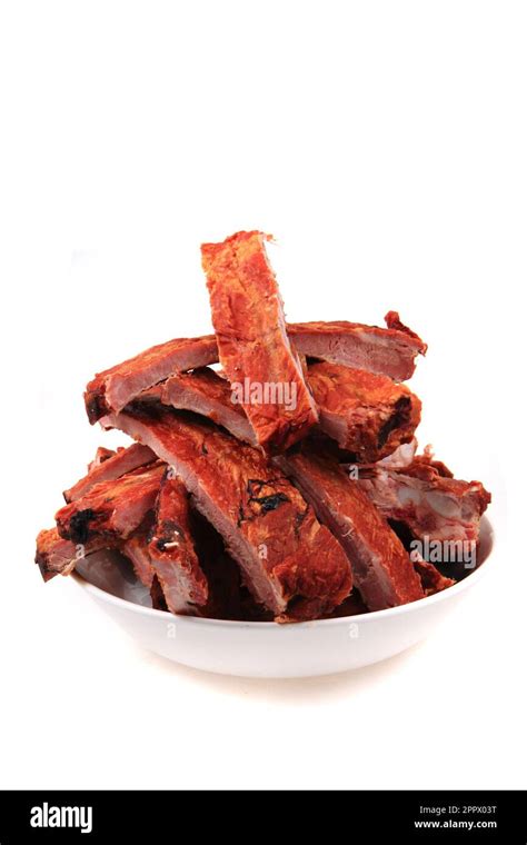 smoked pig ribs isolated on the white background Stock Photo - Alamy