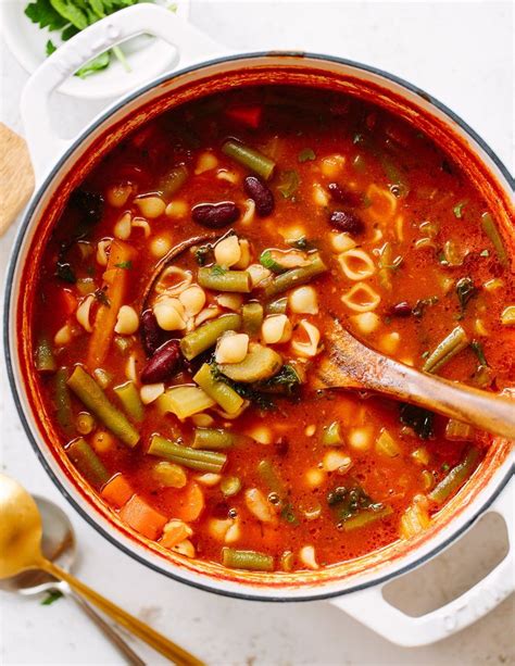 A Large Pot Filled With Soup And Vegetables