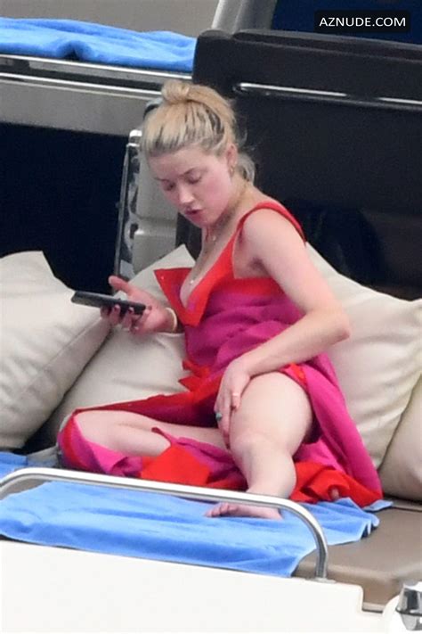 Amber Heard Enjoys A Day In A Red Bikini With Friends Aboard A Yacht On The Amalfi Coast Aznude