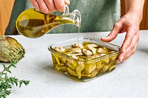 Premium Photo Artichoke Hearts Marinated With Olive Oil And