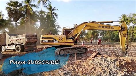 Excavator Cat 320b Loading Trucks Youtube