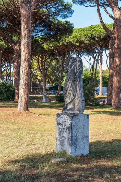 Roman Marble Statue In Ruins Decorating Garden In Ancient Ostias