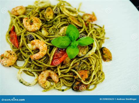 Mixed seafood pasta stock image. Image of cuisine, italien - 259832623