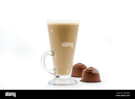 A Tall Glass Of Coffee Latte Or Cappuccino And Generic Coffee Pods That