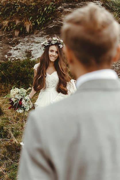 Premium Photo Gorgeous Bride And Stylish Groom Looking At Each Other