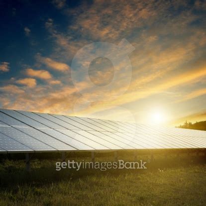 Solar Panels Under Sky On Sunset