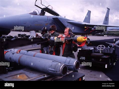 A 36th Tactical Fighter Wing Ground Crew Carries An Aim 9 Sidewinder