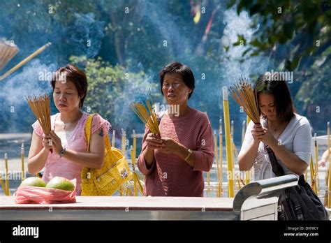 Worship At A Taoist Temple On The Island Of Lantau In Hong Kong Taoism