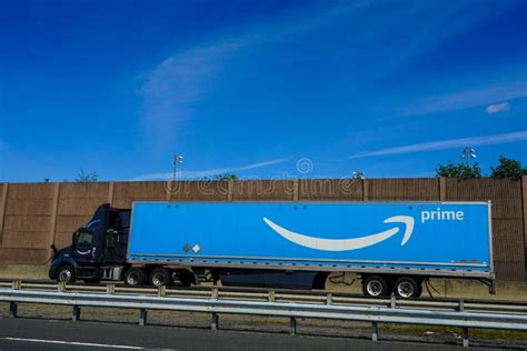 Amazon Truck Driving on the Freeway, the Large Prime Logo Printed on ...