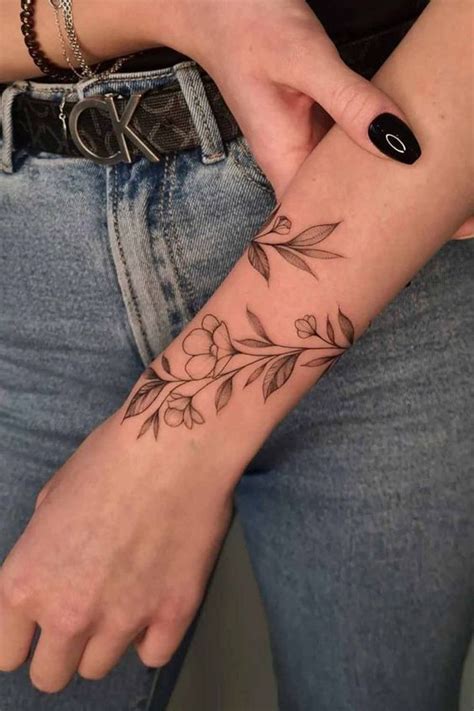 Elegant Vine Tattoo On The Wrist In 10 Ideas Arm Tattoo Wrap Around